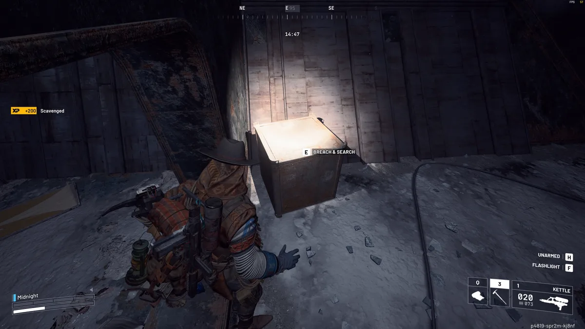 Raider breaching a metal box against a rusty wall