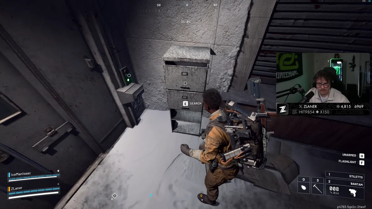 Raider searching a grey filing cabinet next to a steel door