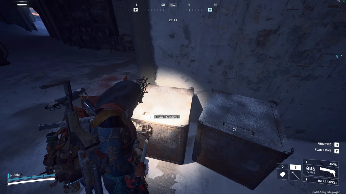 Raider breaching a pair of rusty metal crates