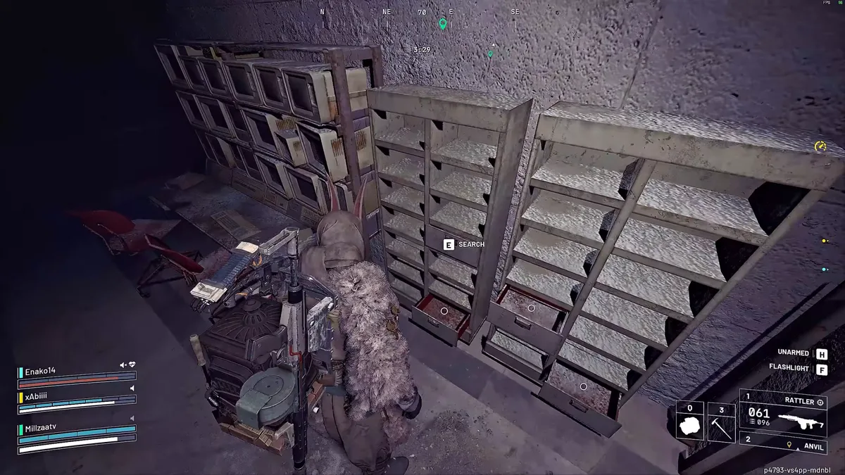 Raider searching a metal pigeonhole cabinet next to old monitors