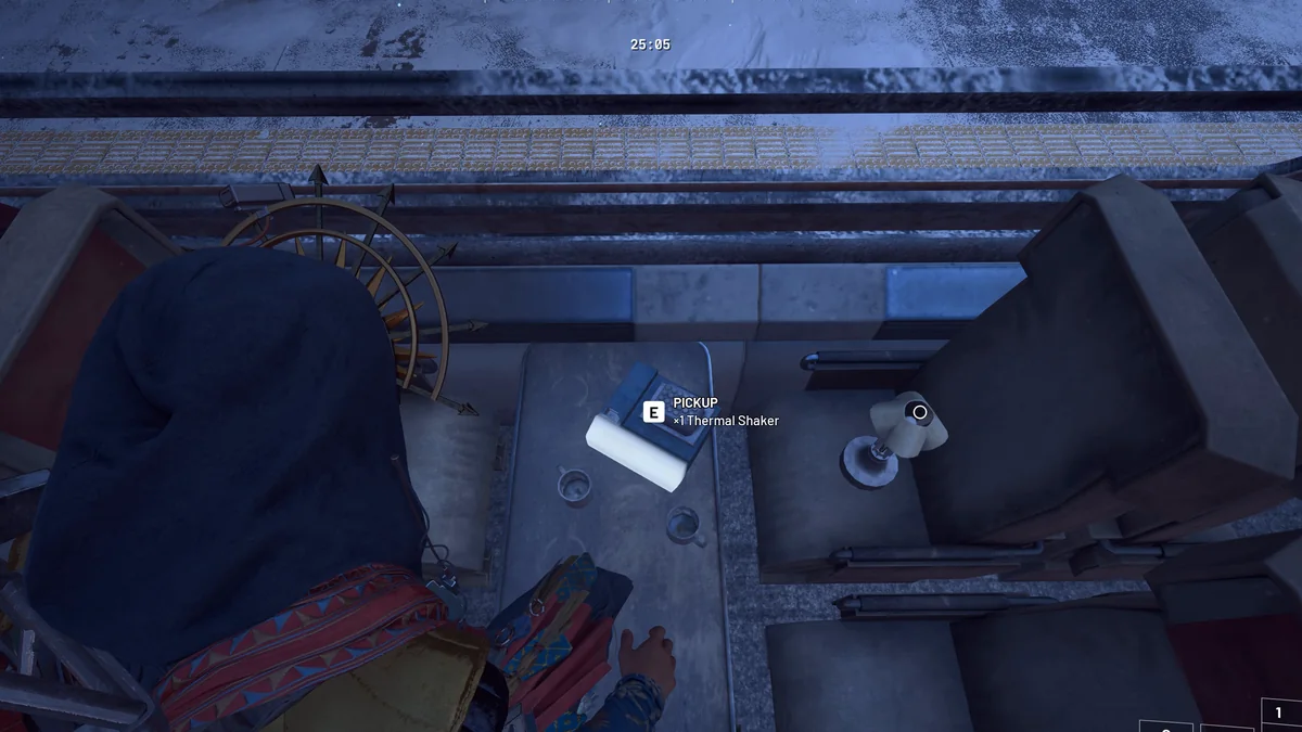 Thermal Shaker pickup prompt on a table in a parked train car under Almatera Station