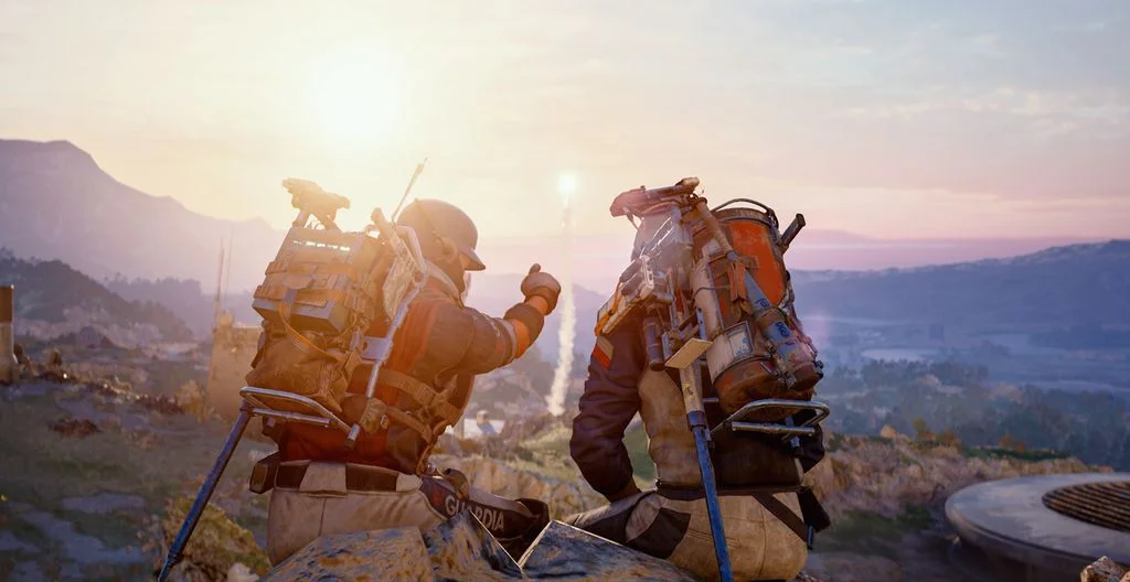 Two ARC Raiders players celebrating a flare on a ridge at sunset, from Embark's PvE toggle announcement